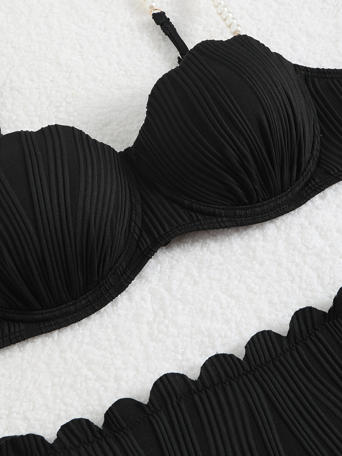 Biquíni de pérolas negro