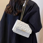 Bolso cruzado con cadena