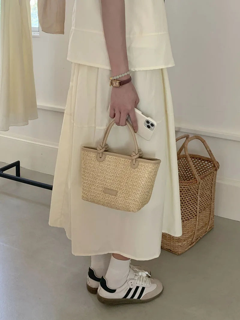 Gran oferta de verano, bolso tejido de paja, cesta de verduras, bolso de mensajero, bolso de cubo simple a la moda para mujer
