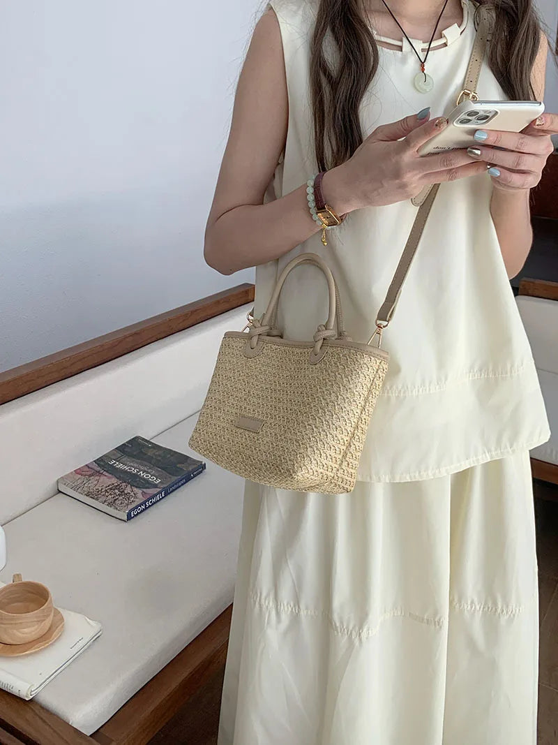 Gran oferta de verano, bolso tejido de paja, cesta de verduras, bolso de mensajero, bolso de cubo simple a la moda para mujer